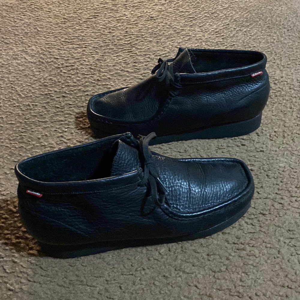 black on black  Clark's wallabies. They are used but in good condition.